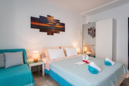Posteľ alebo postele v izbe v ubytovaní Private Holliday Apartment