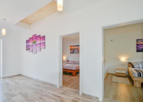 Postel nebo postele na pokoji v ubytování VILLA ALEXANDRIA