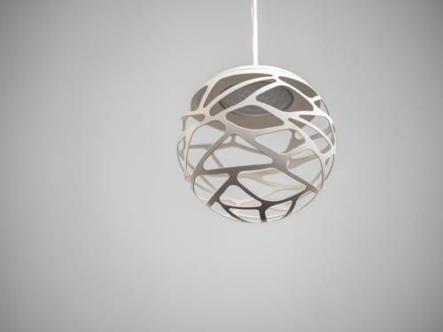 a metal ornament hanging from a ceiling at WESTSIDE Hotel in Munich