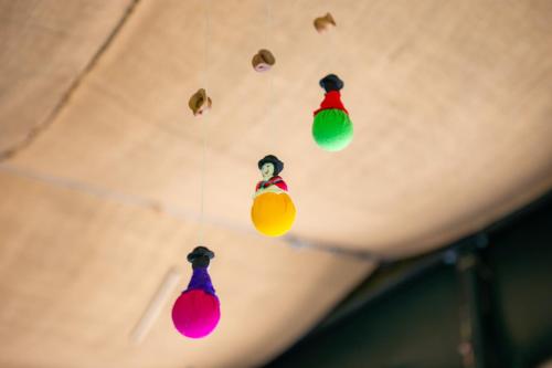 a group of colorful lights hanging from a ceiling at Portalimo Lodge Hotel - Adult Only +12 in Cıralı