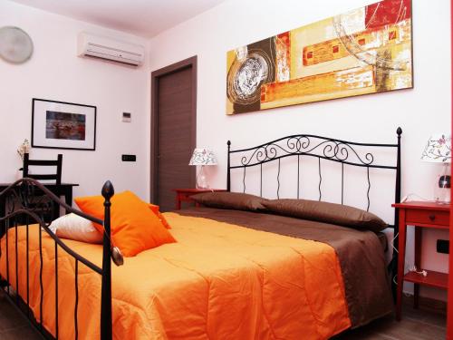 Posteľ alebo postele v izbe v ubytovaní R&B Locanda Le Bighe