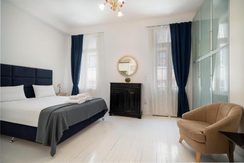 Una cama o camas en una habitación de Apollonas Luxurious Apartments