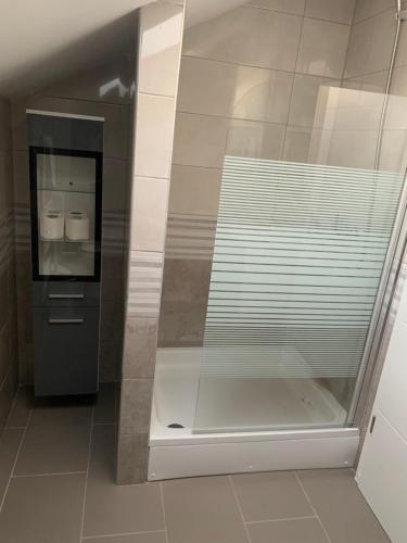 a glass wall in a bathroom with two toilets at The View in Viganj