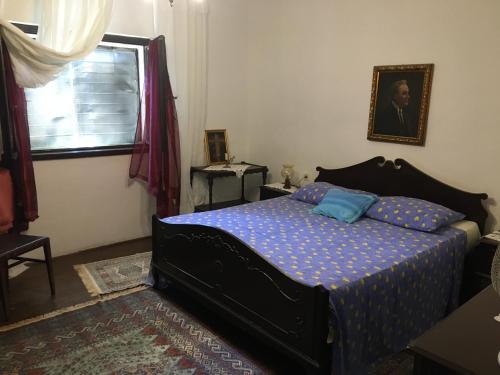 מיטה או מיטות בחדר ב-“Kiko” sea apartments