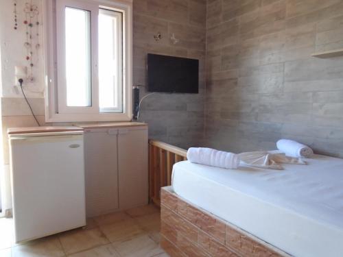 Foto dalla galleria di Orfeas Rooms a Vassiliki