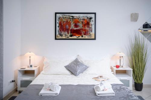 Postel nebo postele na pokoji v ubytování LUXOR Hvar - Main Square Apartments
