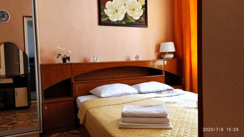 Кровать или кровати в номере Apartment Centralnye