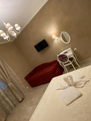 TV a/nebo společenská místnost v ubytování Boutique Hotel Calais Milano