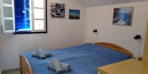 Кровать или кровати в номере Casula Mediterranea