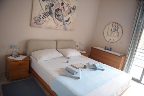 Postel nebo postele na pokoji v ubytování SEA VIEW APARTMENTS Zeus