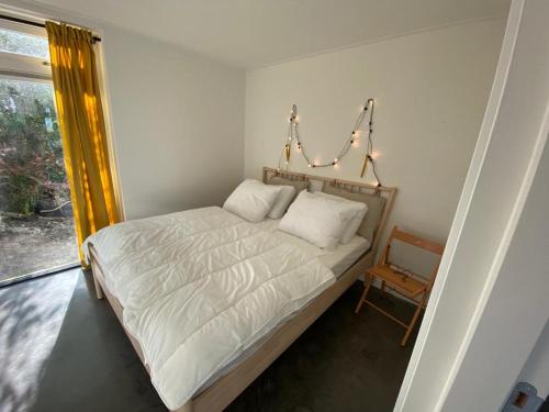 Postel nebo postele na pokoji v ubytování Het Windekind