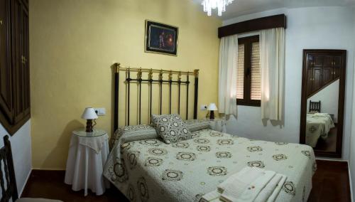 Кровать или кровати в номере Casa Rural la callejita
