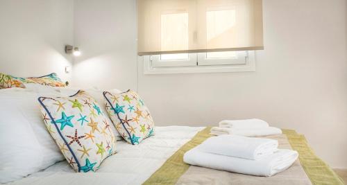 Кровать или кровати в номере Votsalo Boutique Villas
