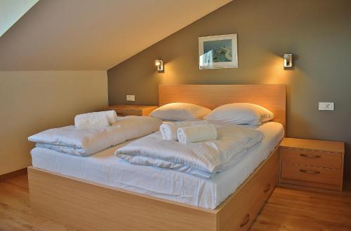 Postel nebo postele na pokoji v ubytování Penthouses Panorama