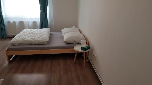Posteľ alebo postele v izbe v ubytovaní Apartmán Pod Zámkem