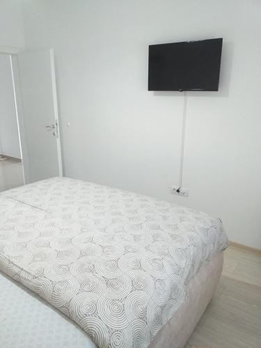 Renome apartmaniにあるベッド