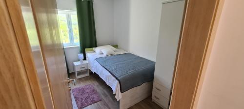 Postel nebo postele na pokoji v ubytování Villa Aninka