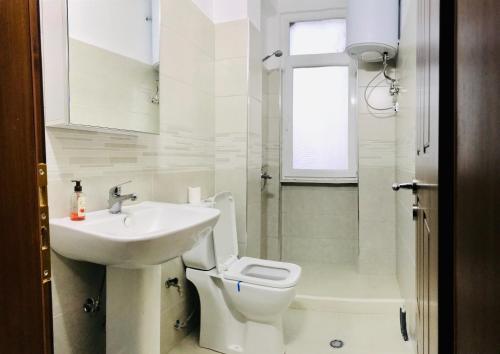 Een badkamer bij Cappuccino Apartment