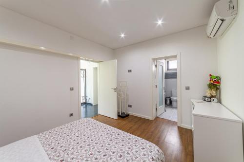 Ένα ή περισσότερα κρεβάτια σε δωμάτιο στο Casas da Fraga - Serra da Estrela