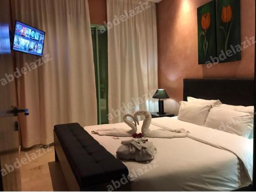 Postel nebo postele na pokoji v ubytování Appartements Marrakech Garden