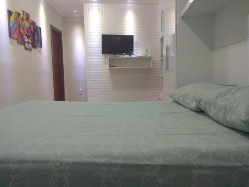 Katil atau katil-katil dalam bilik di Dúplex em Porto Seguro com piscina a 8 minutos das praias