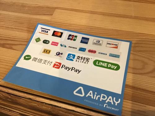 a box of play pay on a wooden table at Kakunodate Guest House Choux in Senboku