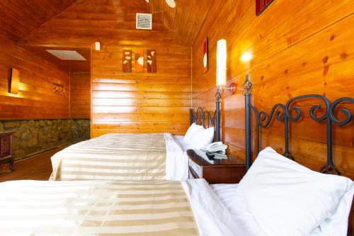Postel nebo postele na pokoji v ubytování Liching Garden Villa
