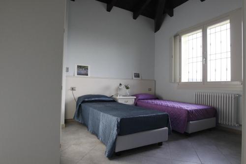 Postel nebo postele na pokoji v ubytování B&B Magic