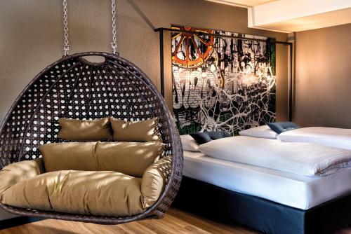 Seminaris Hotel Lüneburg tesisinde bir odada yatak veya yataklar
