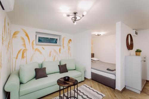 Posteľ alebo postele v izbe v ubytovaní Nádas Center Home Badacsony