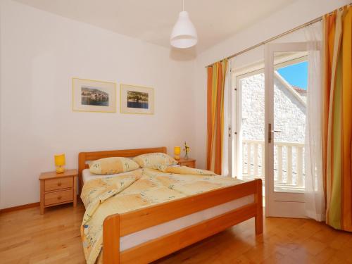 Ένα ή περισσότερα κρεβάτια σε δωμάτιο στο Apartments NewWay Bol