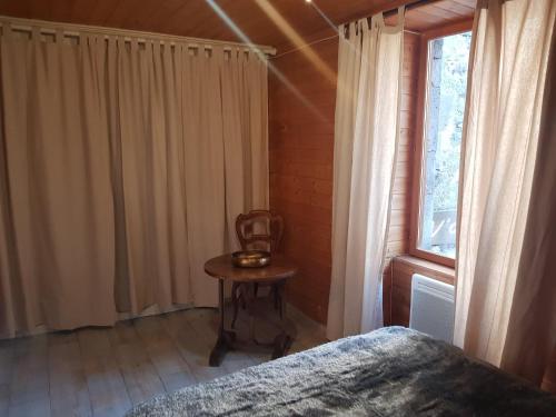 Ένα ή περισσότερα κρεβάτια σε δωμάτιο στο sancy