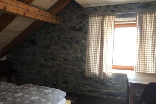 Loft 100m2, im Ökohaus in Suschにあるベッド
