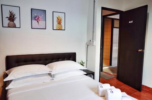 Ένα ή περισσότερα κρεβάτια σε δωμάτιο στο Gfeel Hostel