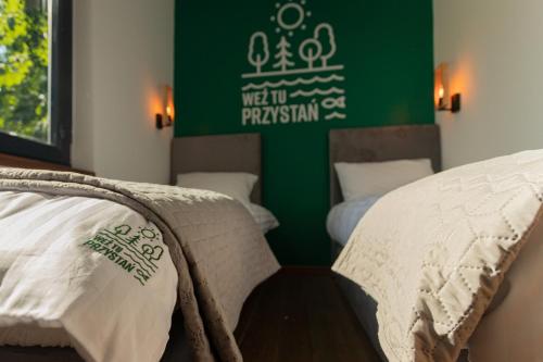 Cama o camas de una habitación en Weź tu Przystań