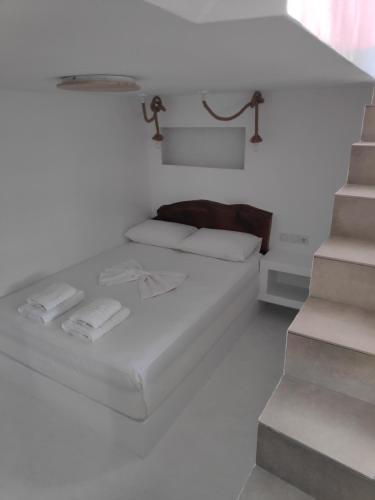 Postel nebo postele na pokoji v ubytování Aletri & Orgoma