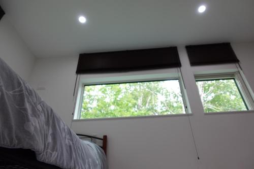 Una cama o camas en una habitación de Cloud9 広い空間 リゾート徒歩5分 Aircon LINE割ID dolry70