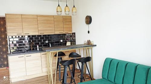 Кухня или мини-кухня в Wieliczka City Apartments
