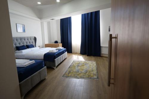 Ένα ή περισσότερα κρεβάτια σε δωμάτιο στο Motel KVELE