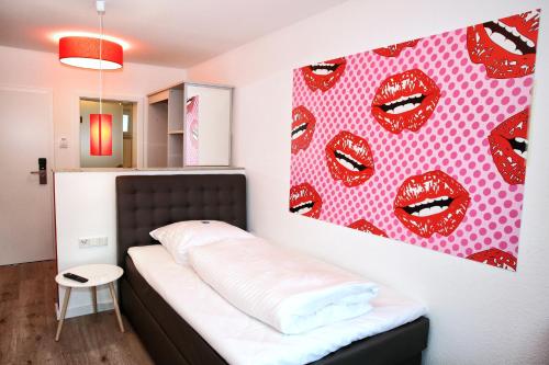Postel nebo postele na pokoji v ubytování Hotel Apart GO25