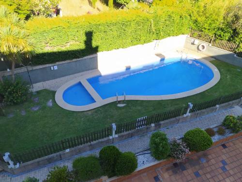 The swimming pool at or close to Apartamento XOSÈ Sanxenxo