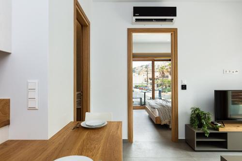 Ένα ή περισσότερα κρεβάτια σε δωμάτιο στο North Coast Seaside Suites