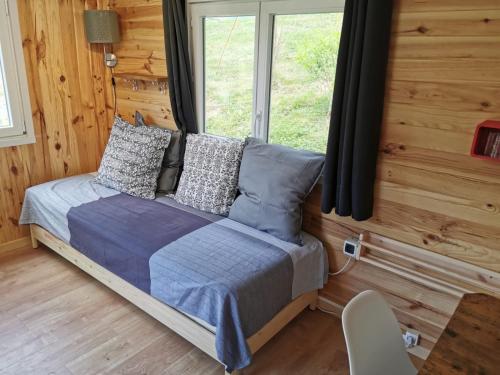Postel nebo postele na pokoji v ubytování Le lodge sur pilotis