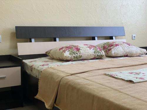 Ένα ή περισσότερα κρεβάτια σε δωμάτιο στο Аппартаменты в отеле Променад с кухней