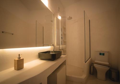 a bathroom with a sink and a toilet at ZOE in Apollonia