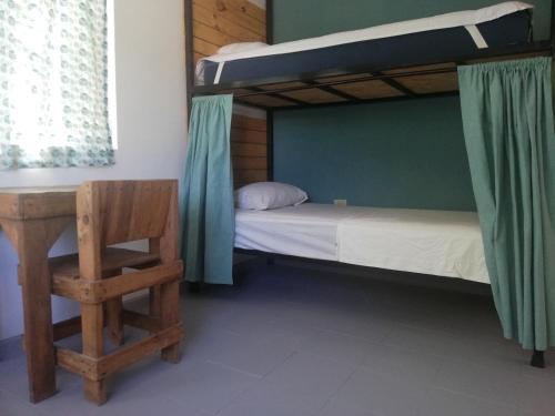 Postel nebo postele na pokoji v ubytování Bermejo Hostel