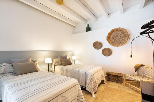 Postel nebo postele na pokoji v ubytování Sant Mori- La Escala Boutique apartment
