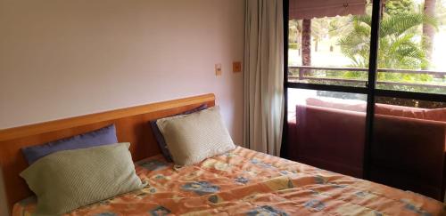 Voodi või voodid majutusasutuse Aquaville - Porto das Dunas toas