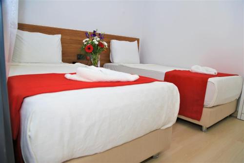 Katil atau katil-katil dalam bilik di Modern Life Hotel Bodrum