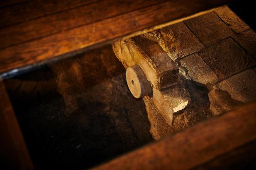 a close up of a wooden drawer with a knob at Chateau du Roi in Mi‘ilyā